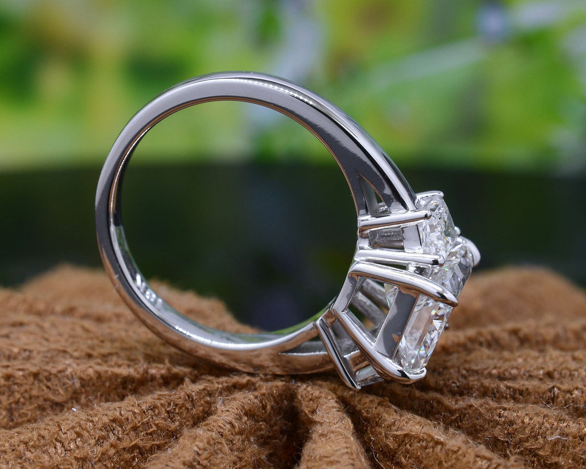 Elongated radiant cut & trapezoid 3 stone ring side profile
