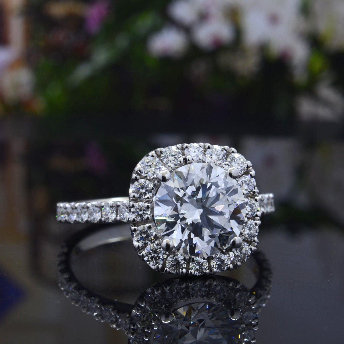 Cushion halo round cut center engagement ring