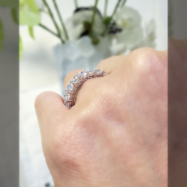 cushion cut eternity on a finger