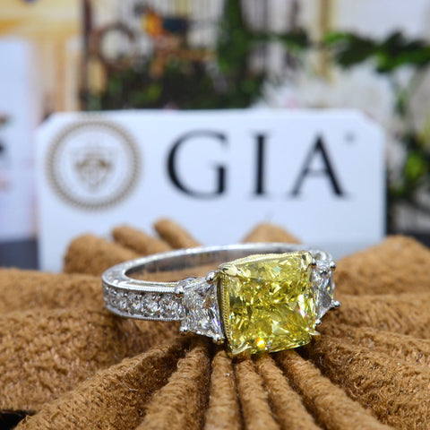 2.90 Ct. Canary Fancy Yellow Cushion Cut Diamond Ring with Trapezoids VS1 GIA Certified