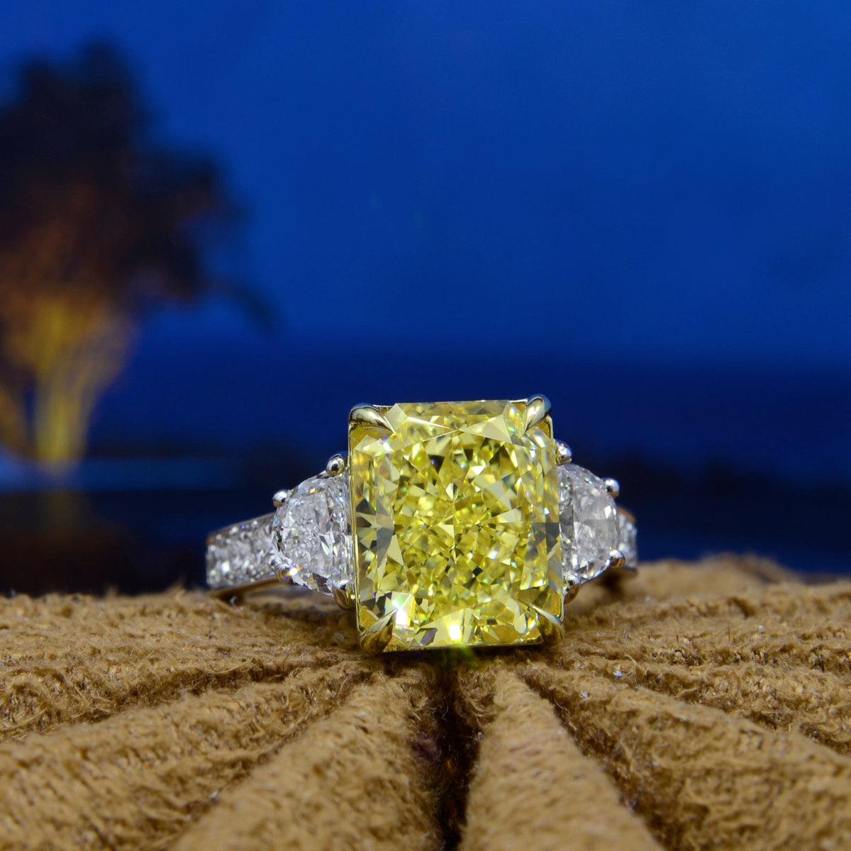 Elongated yellow radiant engagement ring