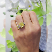 Elongated Yellow Radiant Engagement Ring on Hand