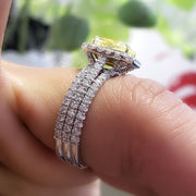 Canary Fancy Light Yellow Radiant Cut Diamond Ring on finger