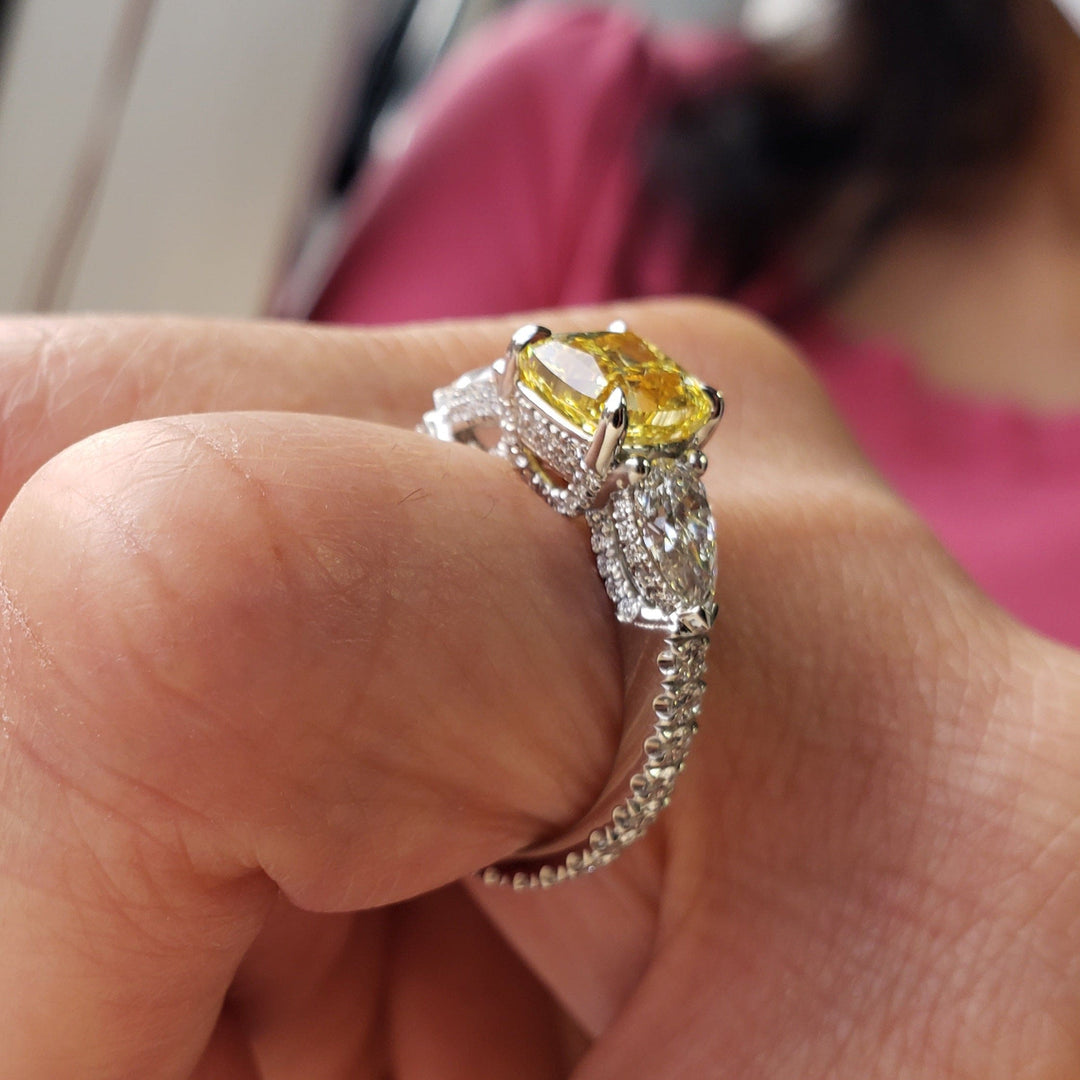 Canary Yellow Three Stone ring side view
