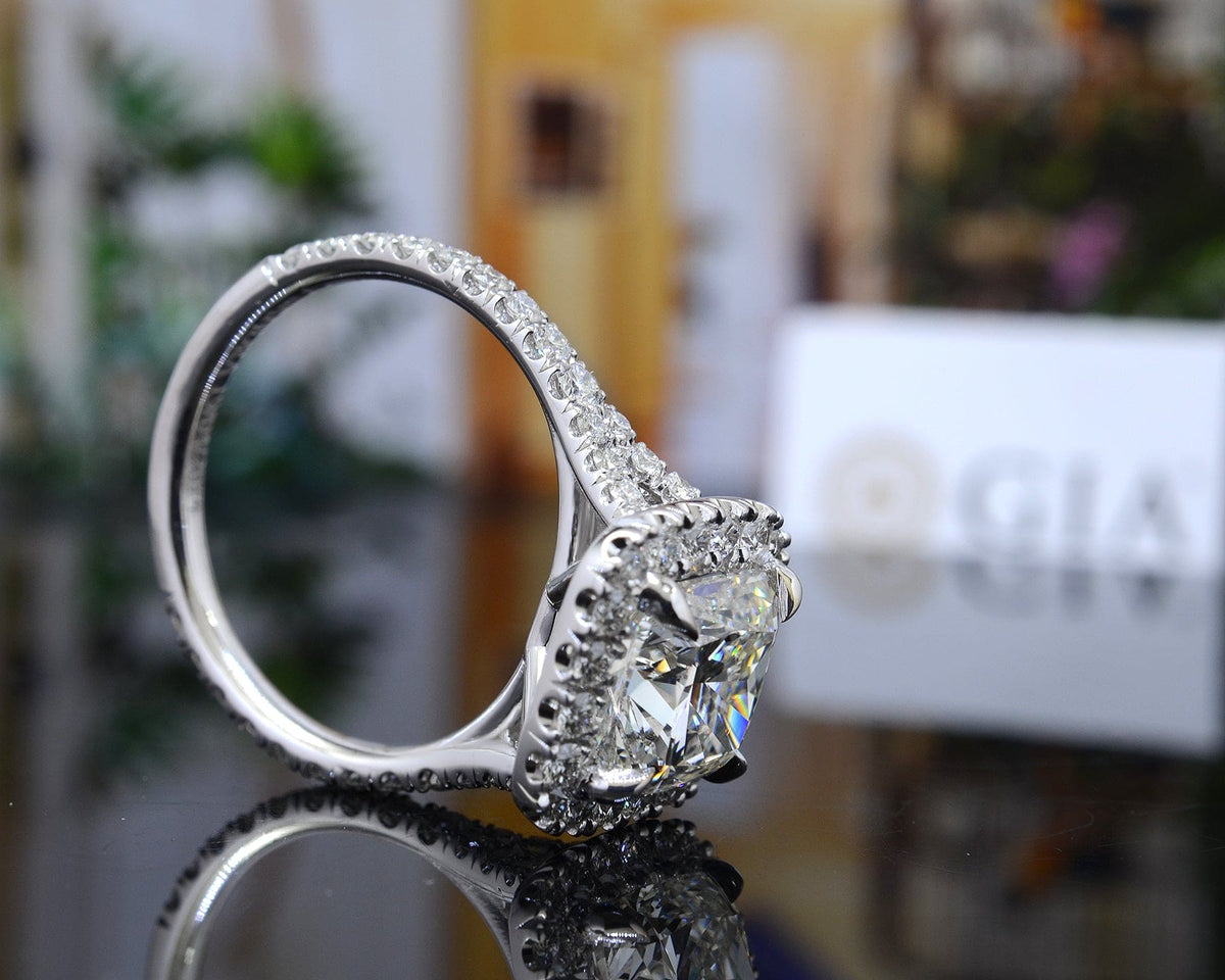 Halo cushion cut diamond split shank ring