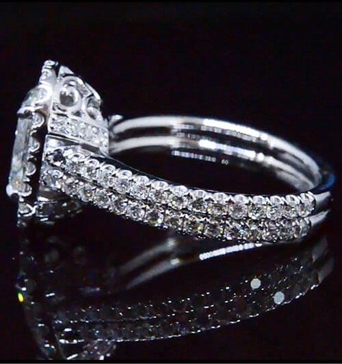 Oval halo engagement ring side view