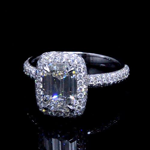 Emerald cut halo engagement ring