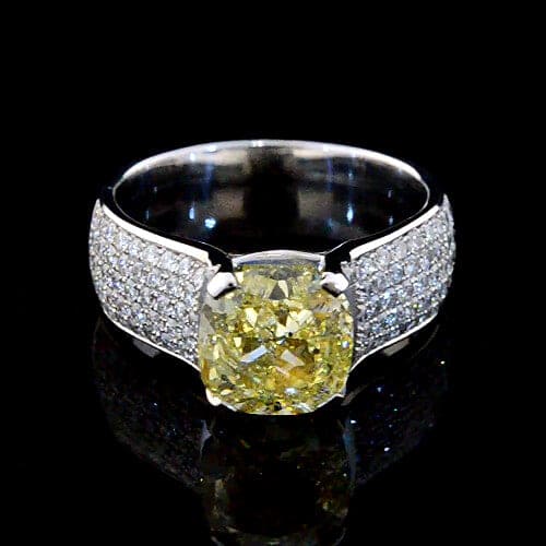 Cushion cut canary yellow diamond ring