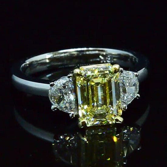 3 stone yellow emerald cut diamond ring