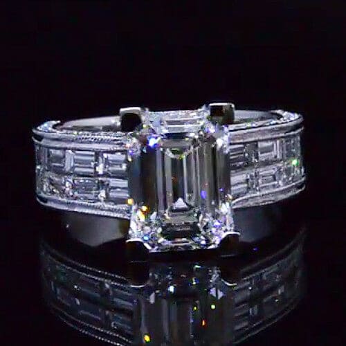 Emerald cut wide shank engagement ring