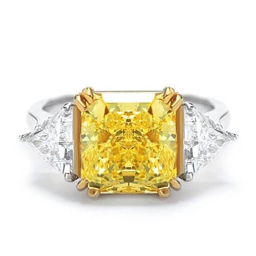 Fancy light yellow radiant cut 3 stone diamond ring