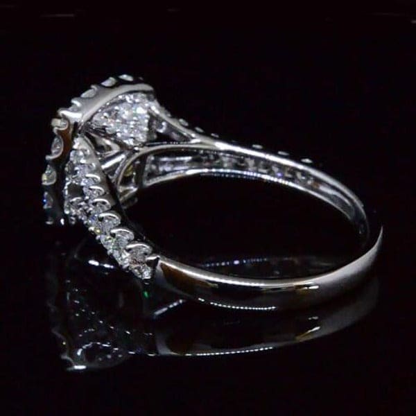 Fancy yellow diamond split shank engagement ring