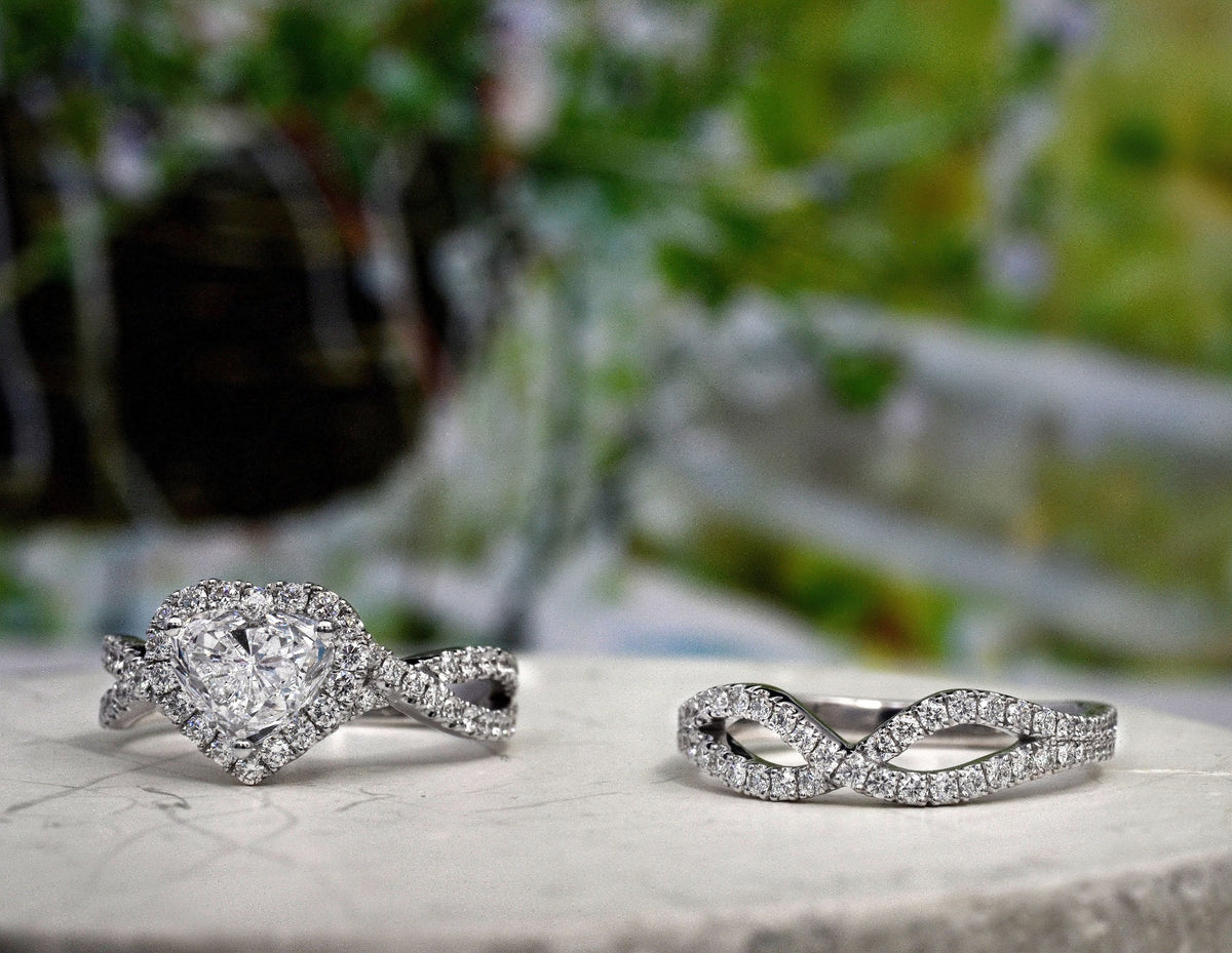 Halo heart twisted engagement ring
