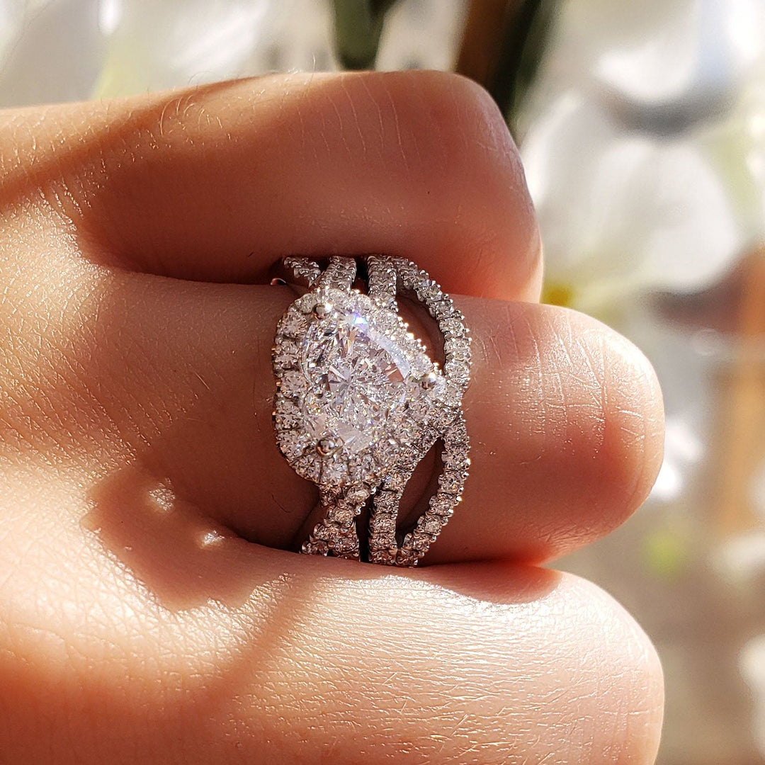 Halo Heart Shaped Twisted Engagement Ring Set On Hand