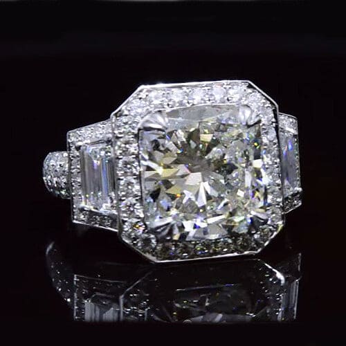 Halo cushion cut with trapezoid cut diamond ring