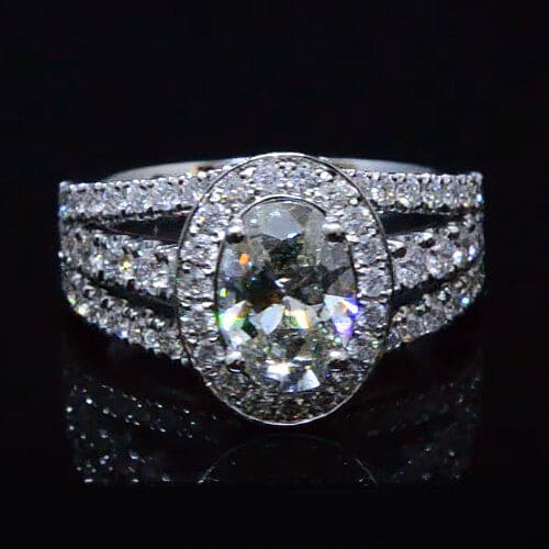 Halo split shank oval engagement ring