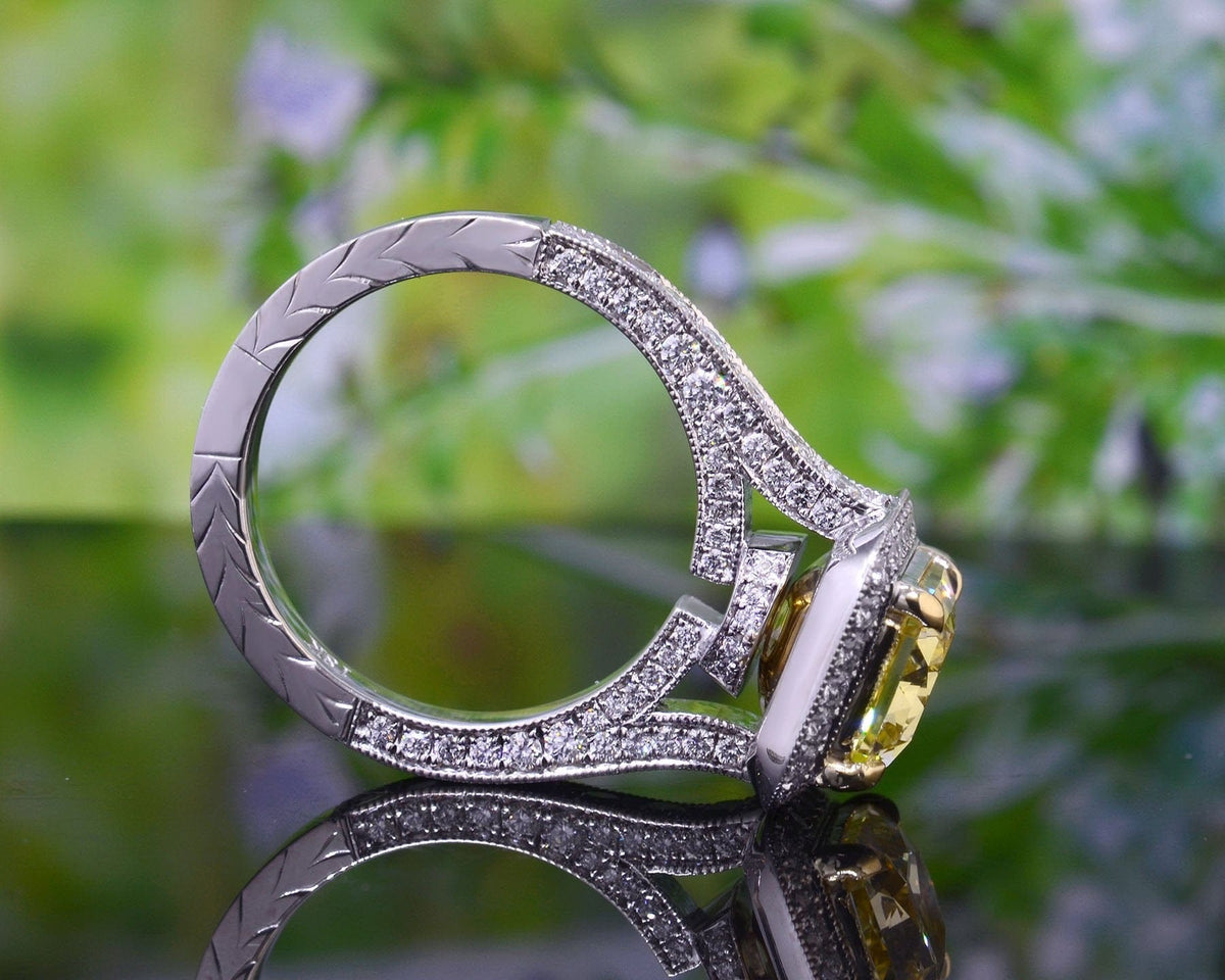 Halo radiant cut fancy yellow engagement ring profile view