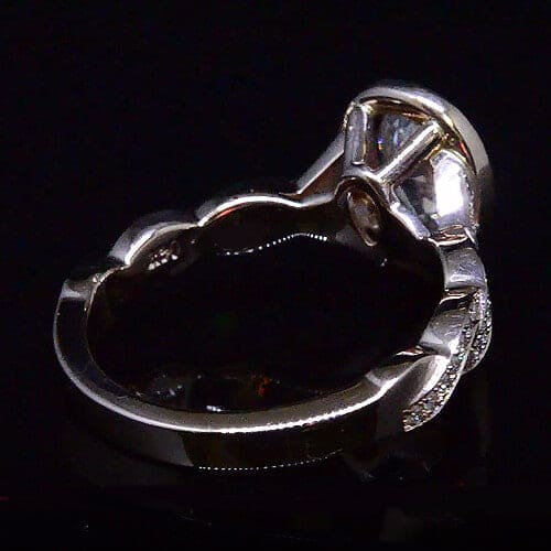 Pear cut diamond halo engagement ring