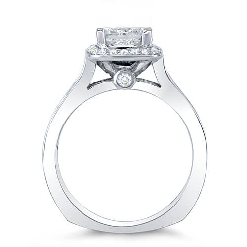 Halo princess cut diamond ring with channel set side profile