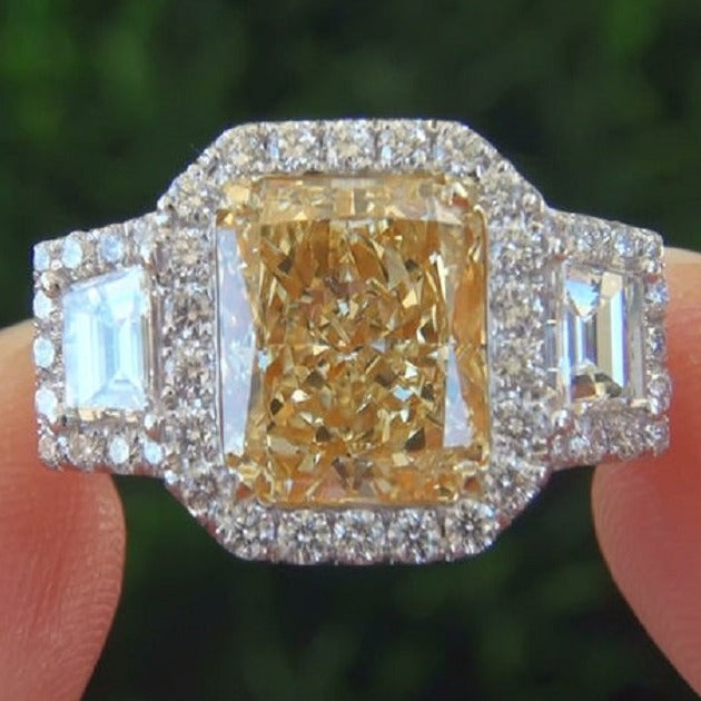 Halo canary fancy yellow radiant cut diamond ring 