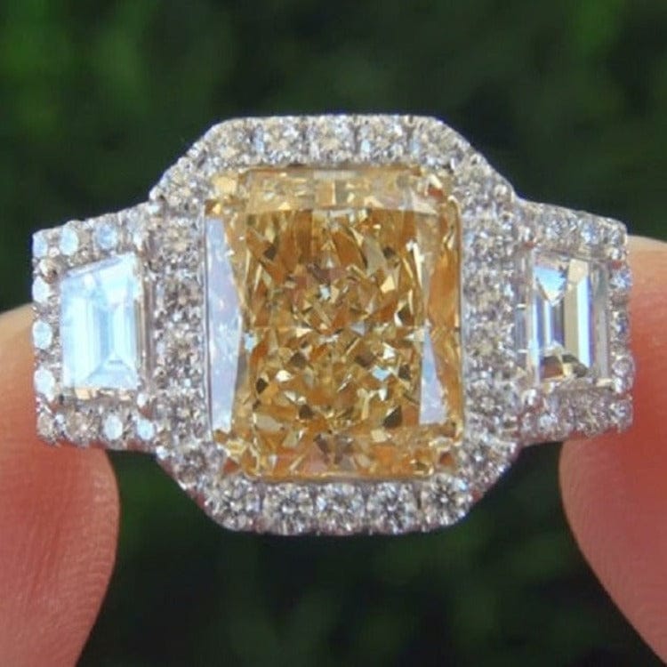 Yellow radiant cut split shank engagement ring front view