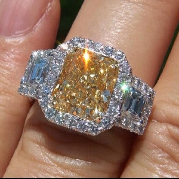 Yellow Radiant Cut Split Shank Engagement Ring on finger