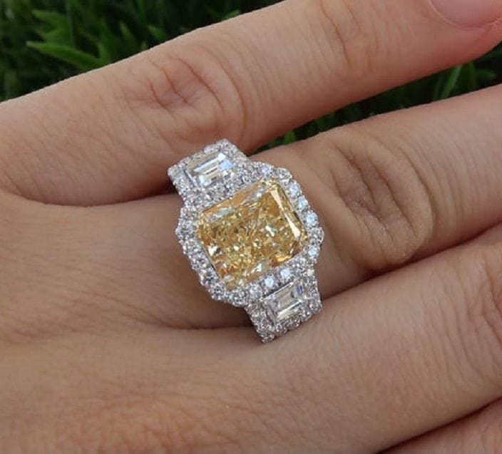 Halo canary fancy yellow radiant cut diamond ring 