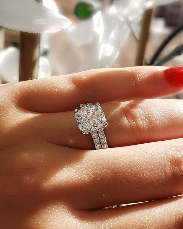 Cushion Cut Engagement Ring Set on Hand