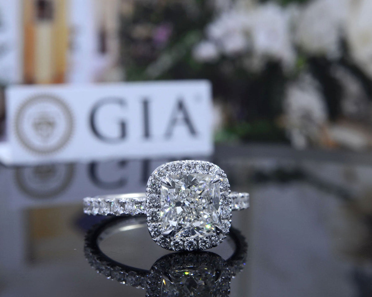 Cushion halo engagement ring eternity