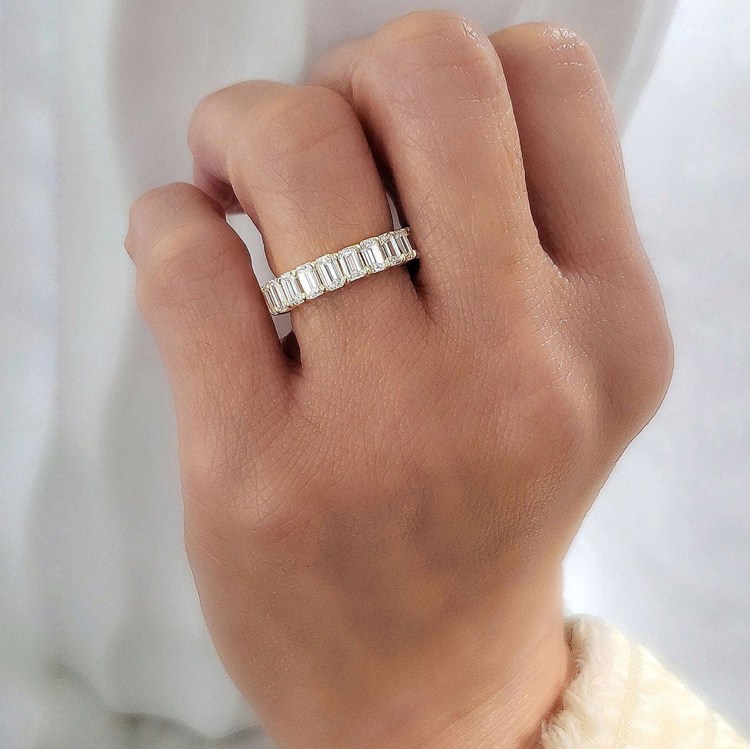 Emerald Cut Eternity Band on Hand Yellow Gold