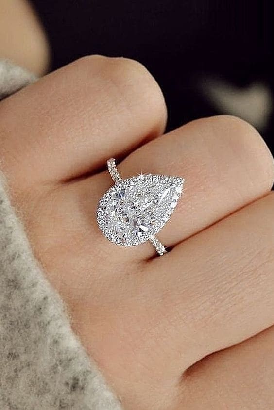 Tear Drop Pear Halo Engagement Ring on Hand