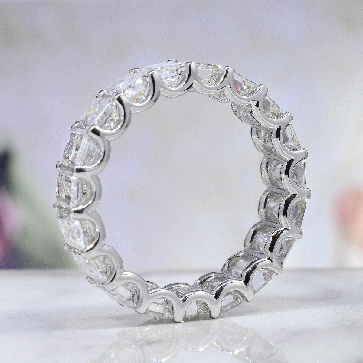 5 carats emerald cut eternity band side view