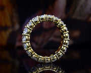 Oval cut natural diamond eternity ring - side view