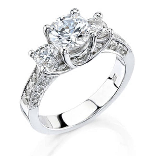 3 stone round cut engagement ring with accents