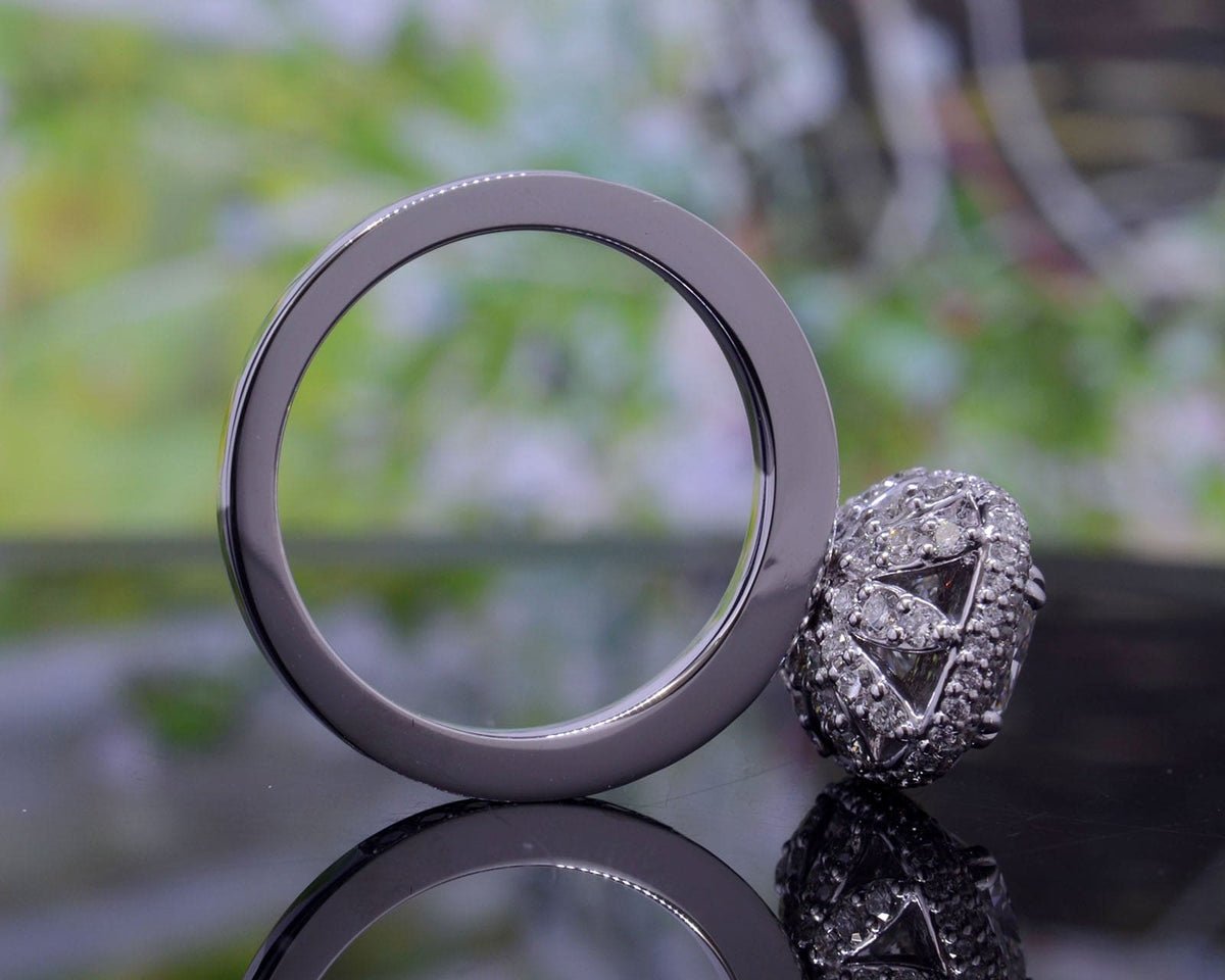 Fleur halo cushion cut engagement ring profile view