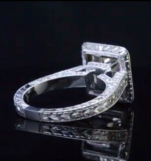Vintage halo engagement ring side profile