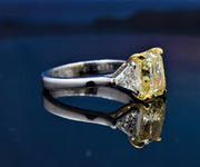 Elongated Radiant Fancy Light Yellow & Trillions 3 Stone Ring Side Profile