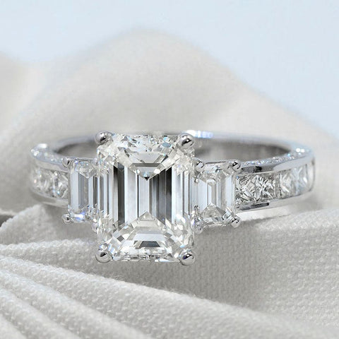 2.80 Ct. 3 Stone Emerald Cut Diamond Ring with Accents H Color VS2 GIA Certified