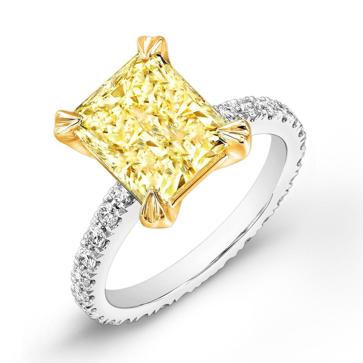Elongated yellow radiant cut engagement ring