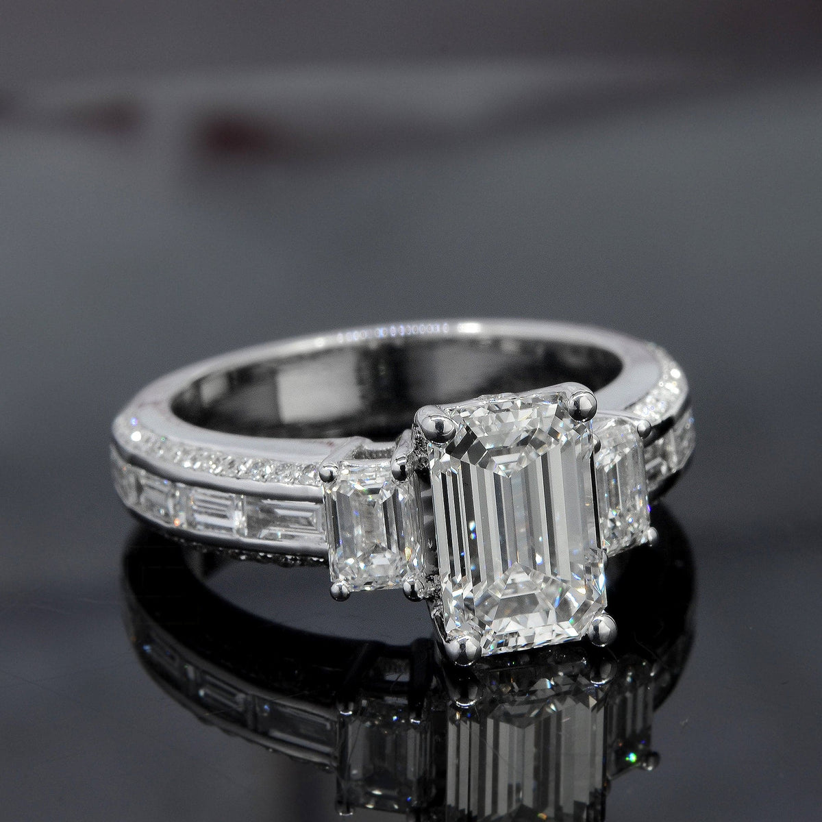 Emerald cut & baguette engagement ring