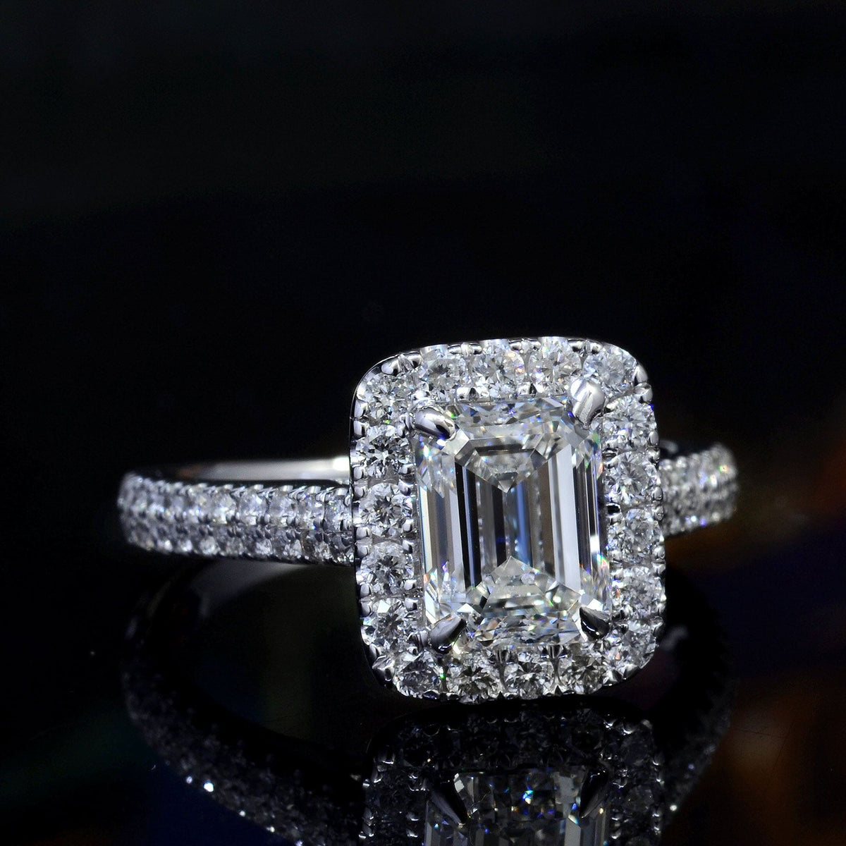Emerald cut halo engagement ring