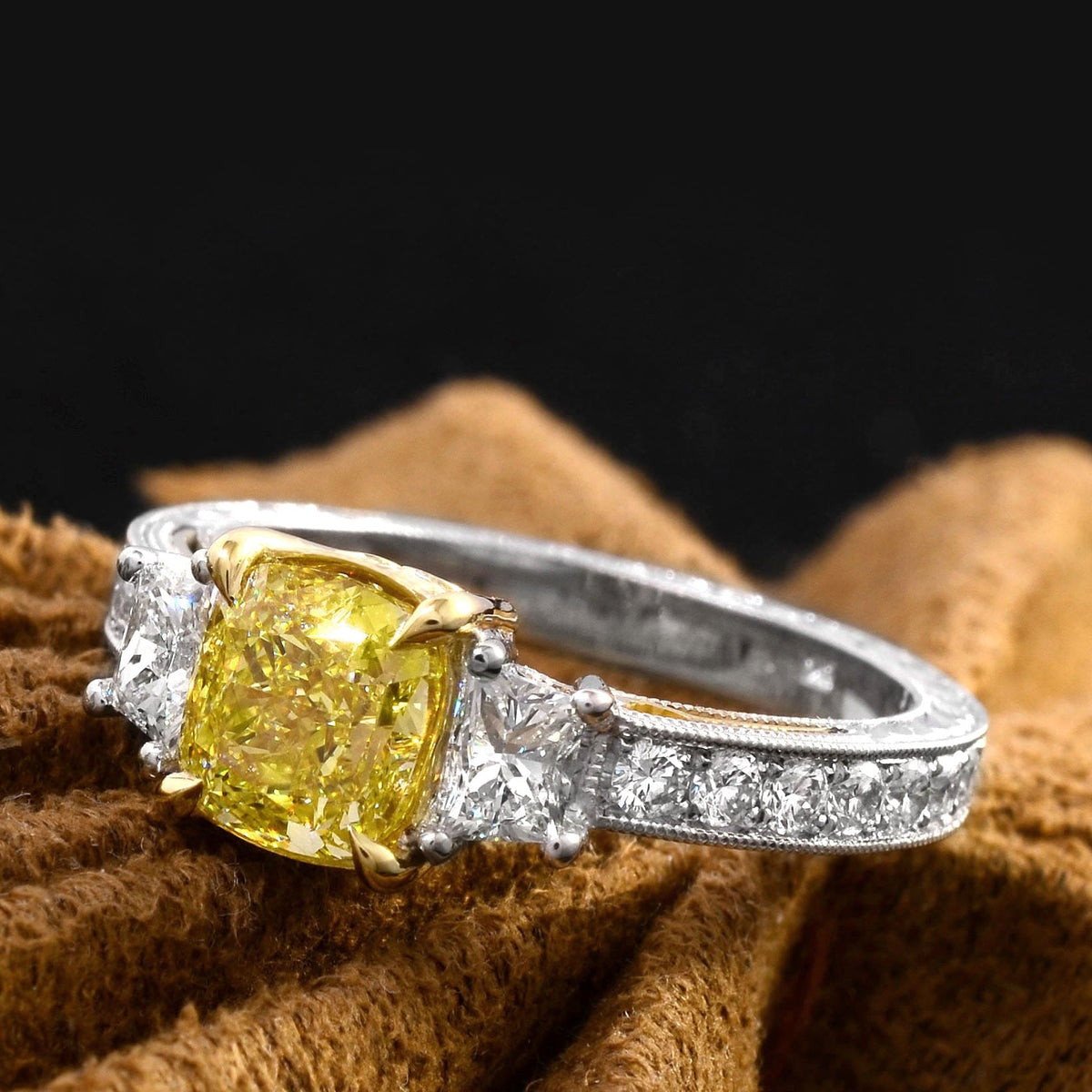 Yellow cushion cut hand carved diamond ring front view
