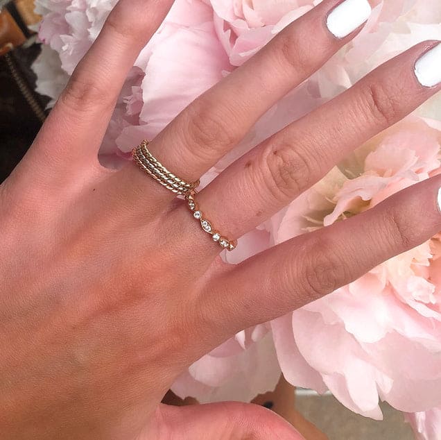 Olympic twist gold ring