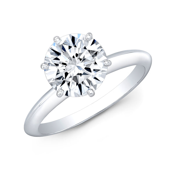 Knife Edge Solitaire Ring top view white background