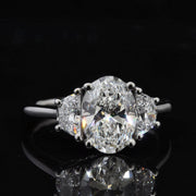 3 Stone Oval Diamond Ring with Half Moons