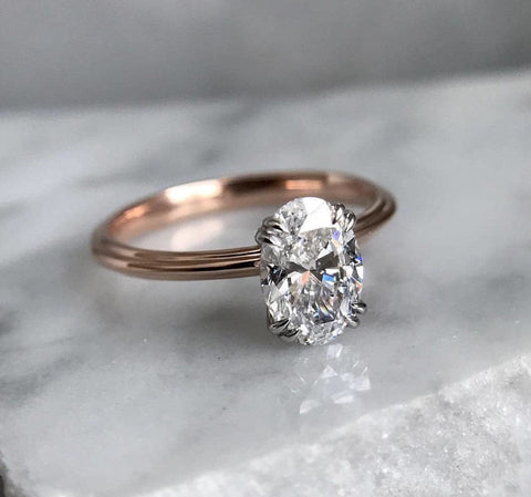 Four Prong Solitaire Ring
