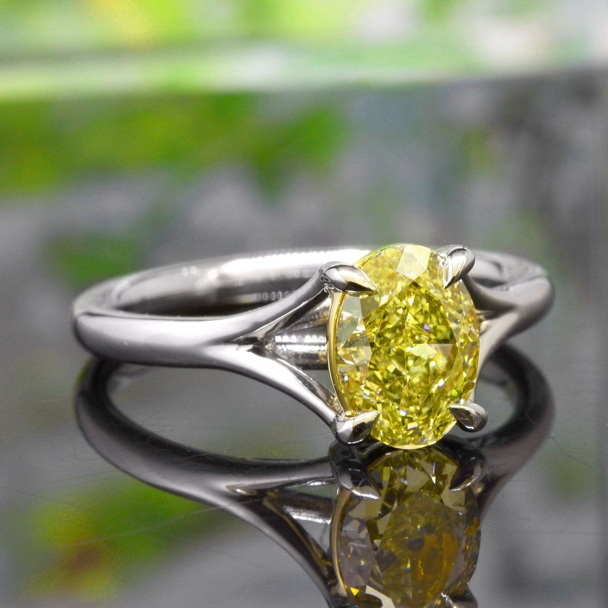 Canary fancy yellow oval cut split shank solitaire ring