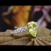 3.85 Ct Canary Fancy Light Yellow Pear Shaped Hidden Halo Engagement Ring VVS1 GIA Certified