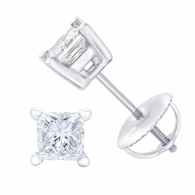 Pair of princess cut square diamond earrings on a white background