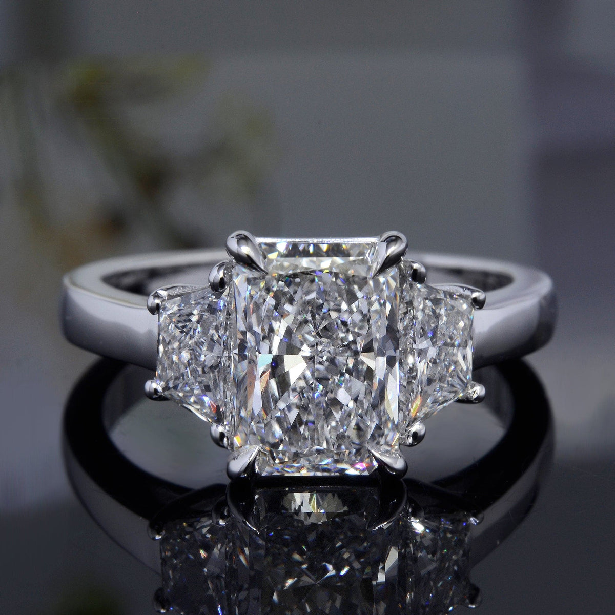 Radiant cut 3 stone diamond engagement ring